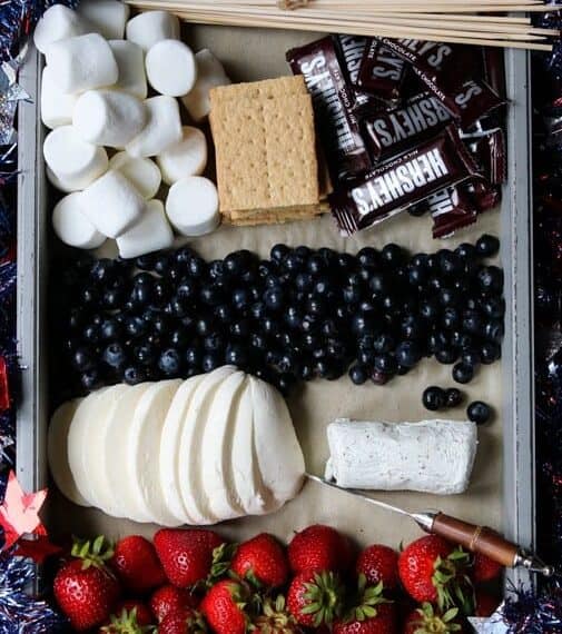 A cheese board with red, white and blue colors